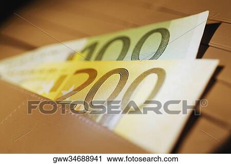 Close-up of Euro banknotes in a wallet View Large Photo Image Stock Image - Close-up of Euro banknotes in a wallet. Fotosearch