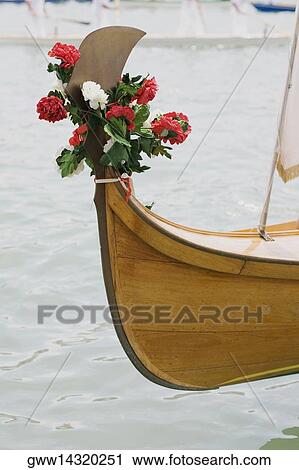 Close-up of flowers tied at the edge of gondola, Venice, Veneto, Italy View Large Photo Image Stock Image - Close-up of flowers tied at the edge of gondola, Venice, Veneto, Italy. Fotosearch