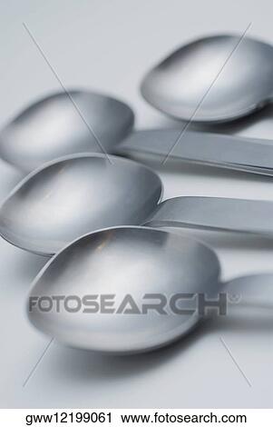 Close-up of four ladles View Large Photo Image Stock Image - Close-up of four ladles. Fotosearch