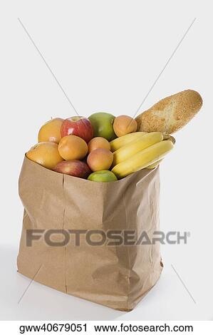 Close-up of fruit in a paper bag View Large Photo Image Stock Image - Close-up of fruit in a paper bag. Fotosearch