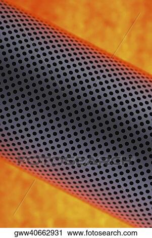 Stock Image - Close-up of holes on a metal cylinder. Fotosearch