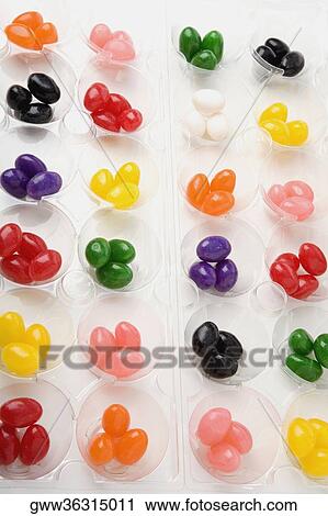 Stock Image - Close-up of jellybeans in bowls. Fotosearch