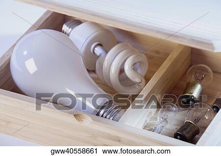 Close-up of light bulbs in a wooden box View Large Photo Image Stock Image - Close-up of light bulbs in a wooden box. Fotosearch