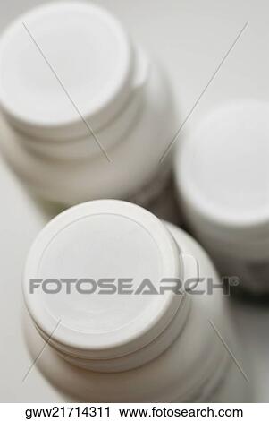 Close-up of moisturizer jars View Large Photo Image Stock Image - Close-up of moisturizer jars. Fotosearch