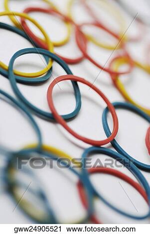 Stock Image - Close-up of multi-colored plastic bracelets. Fotosearch