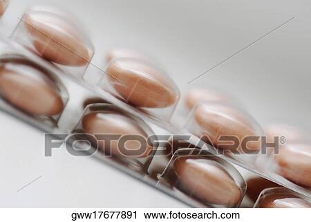 Close-up of pills in a blister pack View Large Photo Image Stock Image - Close-up of pills in a blister pack. Fotosearch