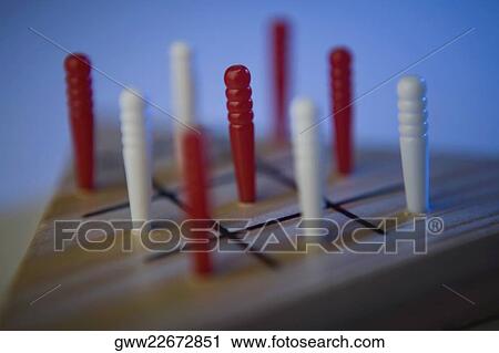 Close-up of pins on a game board View Large Photo Image Stock Image - Close-up of pins on a game board. Fotosearch