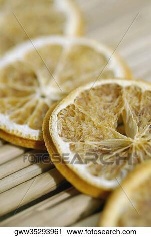 Close-up of slices of lime on sticks View Large Photo Image Stock Image - Close-up of slices of lime on sticks. Fotosearch