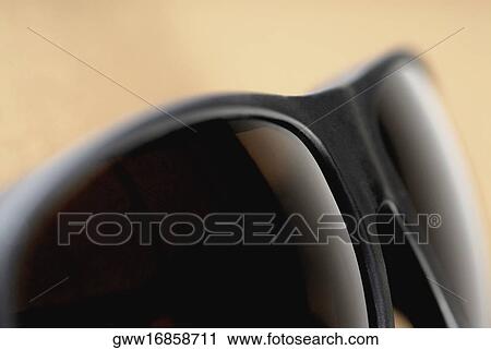 Close-up of sunglasses View Large Photo Image Stock Image - Close-up of sunglasses. Fotosearch