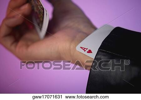 Close-up of the ace of hearts under a cuff of a coat View Large Photo Image Stock Image - Close-up of the ace of hearts under a cuff of a coat. Fotosearch