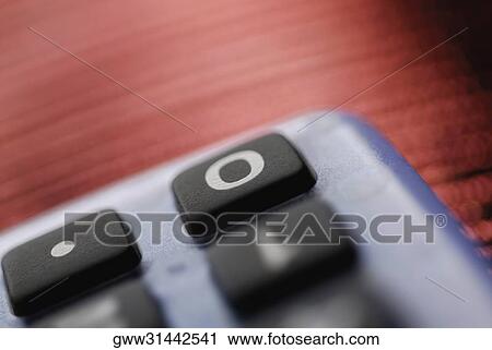 Stock Image - Close-up of the keypad of a calculator. Fotosearch