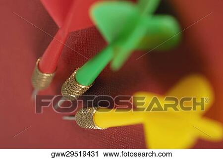Close-up of three darts on a dart board View Large Photo Image Stock Image - Close-up of three darts on a dart board. Fotosearch