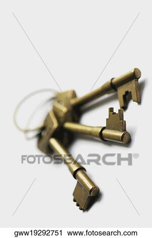 Close-up of three keys in a key ring View Large Photo Image Stock Image - Close-up of three keys in a key ring. Fotosearch