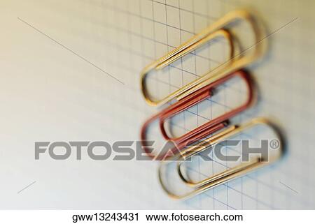Close-up of three paper clips View Large Photo Image Stock Image - Close-up of three paper clips. Fotosearch