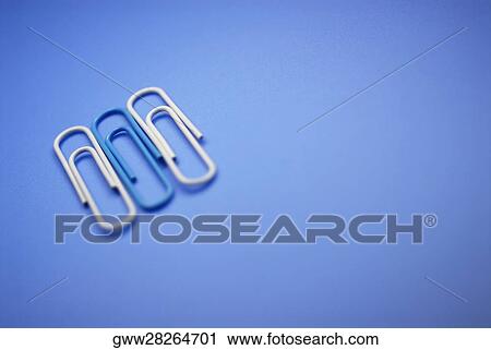 Close-up of three paper clips View Large Photo Image Stock Image - Close-up of three paper clips. Fotosearch