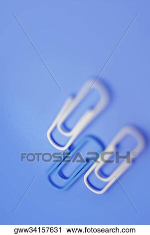 Close-up of three paper clips View Large Photo Image Stock Image - Close-up of three paper clips. Fotosearch