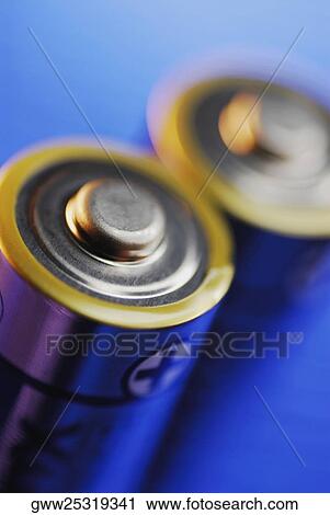 Stock Image - Close-up of two batteries. Fotosearch