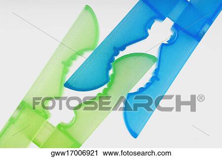 Close-up of two clothespins View Large Photo Image Stock Image - Close-up of two clothespins. Fotosearch