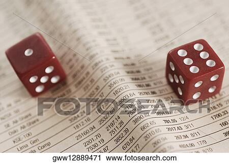 Close-up of two dices on a financial newspaper View Large Photo Image Stock Image - Close-up of two dices on a financial newspaper. Fotosearch