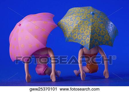 Close-up of two dolls View Large Photo Image Stock Image - Close-up of two dolls. Fotosearch