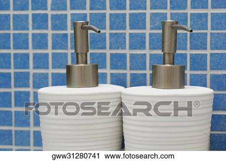 Close-up of two soap dispensers View Large Photo Image Stock Image - Close-up of two soap dispensers. Fotosearch