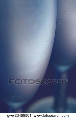 Stock Image - Close-up of two stem glasses. Fotosearch
