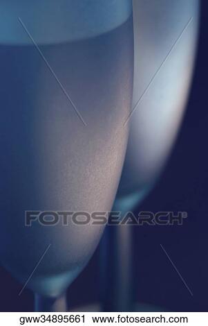 Close-up of two stem glasses View Large Photo Image Stock Image - Close-up of two stem glasses. Fotosearch