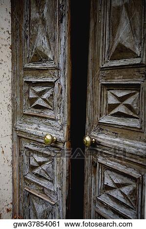 Close-up of two wooden doors View Large Photo Image Stock Image - Close-up of two wooden doors. Fotosearch