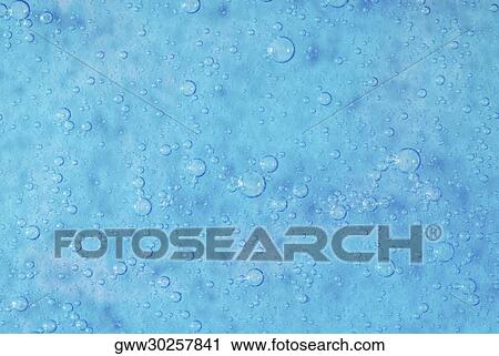 Close-up of water drops on a blue surface View Large Photo Image Stock Image - Close-up of water drops on a blue surface. Fotosearch