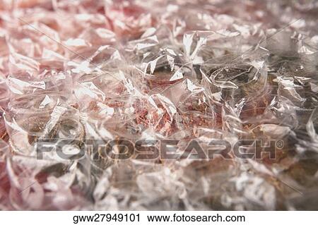 Stock Image - Close-up of wrapped sweets. Fotosearch