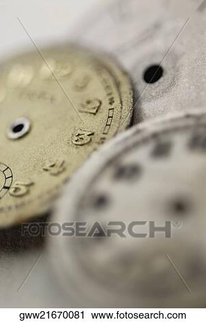 Stock Image - Close-up of wristwatch dials. Fotosearch