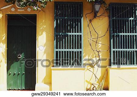 Stock Image - Closed door of a house. Fotosearch