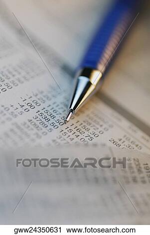 High angle view of a pen with stock market data sheets View Large Photo Image Stock Image - High angle view of a pen with stock market data sheets. Fotosearch