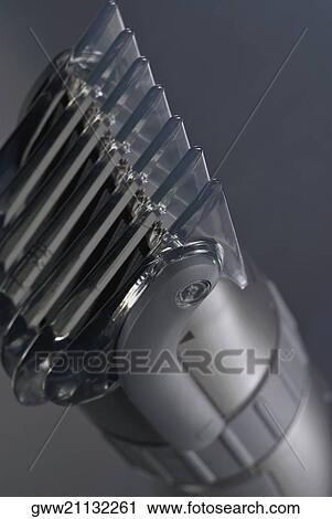 Stock Image - High angle view of an electric razor. Fotosearch
