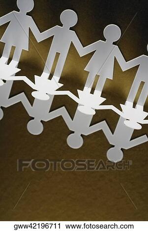 High angle view of paper chain dolls View Large Photo Image Stock Image - High angle view of paper chain dolls. Fotosearch