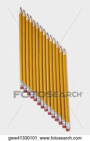 High angle view of pencils in a row View Large Photo Image Stock Image - High angle view of pencils in a row. Fotosearch