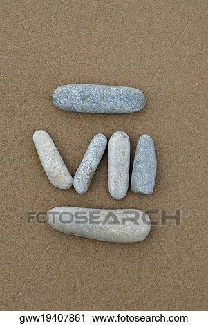 High angle view of Roman numeral created with pebbles View Large Photo Image Stock Image - High angle view of Roman numeral created with pebbles. Fotosearch
