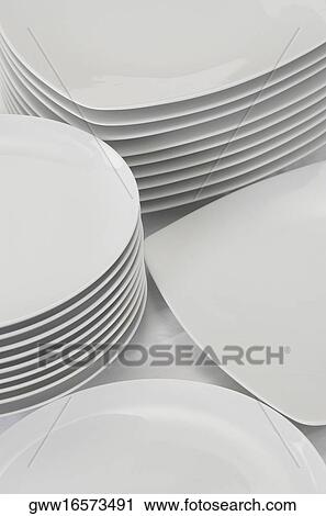 High angle view of stack of plates View Large Photo Image Stock Image - High angle view of stack of plates. Fotosearch