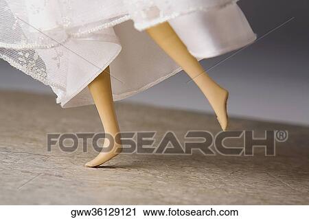 Low section view of a doll View Large Photo Image Stock Image - Low section view of a doll. Fotosearch