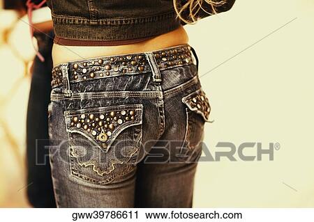 Mid section view of a woman View Large Photo Image Stock Image - Mid section view of a woman. Fotosearch