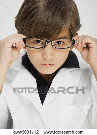 Portrait of a boy dressed as a doctor View Large Photo Image Stock Image - Portrait of a boy dressed as a doctor. Fotosearch