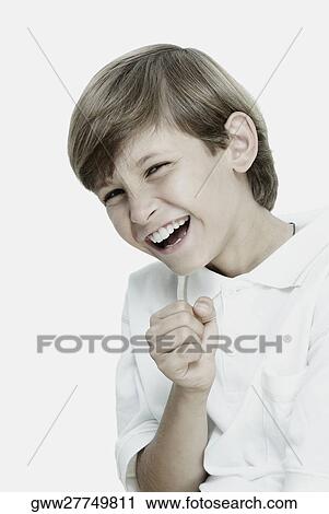 Portrait of a boy making a fist and smiling View Large Photo Image Stock Image - Portrait of a boy making a fist and smiling. Fotosearch