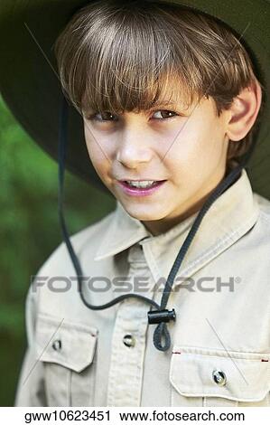 Stock Image - Portrait of a boy wearing a hat. Fotosearch