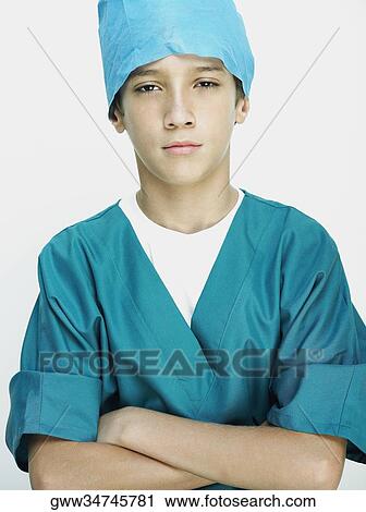 Portrait of a boy wearing surgical scrubs View Large Photo Image Stock Image - Portrait of a boy wearing surgical scrubs. Fotosearch