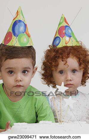 Portrait of a boy with his sister View Large Photo Image Stock Image - Portrait of a boy with his sister. Fotosearch