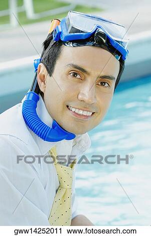 Portrait of a businessman a snorkel and smiling View Large Photo Image Stock Image - Portrait of a businessman a snorkel and smiling. Fotosearch