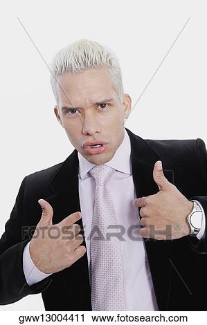 Portrait of a businessman pointing at himself View Large Photo Image Stock Image - Portrait of a businessman pointing at himself. Fotosearch