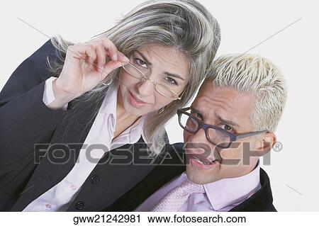 Portrait of a businesswoman and a businessman wearing eyeglasses View Large Photo Image Stock Image - Portrait of a businesswoman and a businessman wearing eyeglasses. Fotosearch
