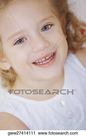 Portrait of a girl smiling View Large Photo Image Stock Image - Portrait of a girl smiling. Fotosearch