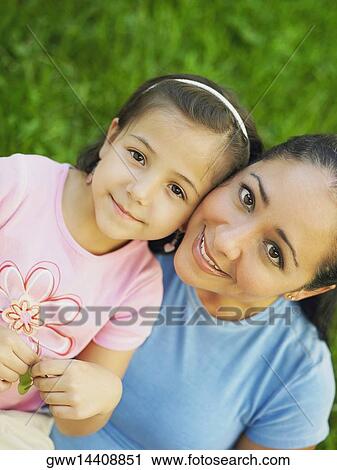 Portrait of a girl with her mother View Large Photo Image Stock Image - Portrait of a girl with her mother. Fotosearch
